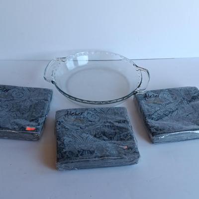 Glass pie dish with three new packages of napkins - Just in time for fresh apple pie!