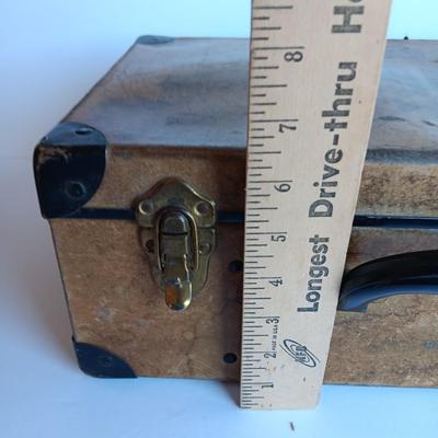 Vintage Bakelite handled case with a variety of sewing items inside