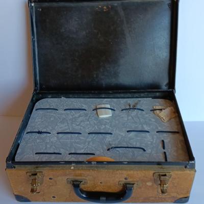 Vintage Bakelite handled case with a variety of sewing items inside