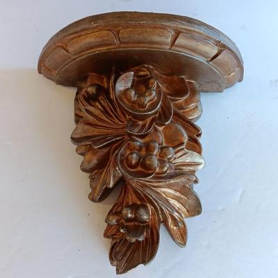 Gold and maroon decorative framed wall mirror with small shelf
