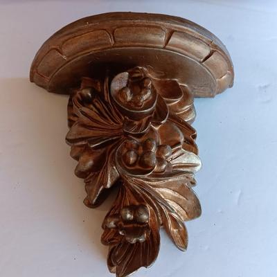 Gold and maroon decorative framed wall mirror with small shelf