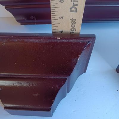 Cherry colored wall shelf with two matching small shelves
