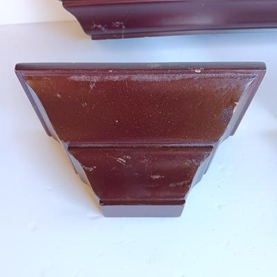 Cherry colored wall shelf with two matching small shelves