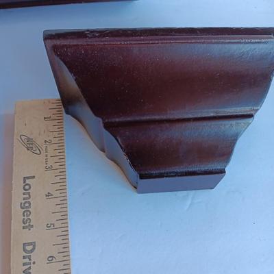 Cherry colored wall shelf with two matching small shelves