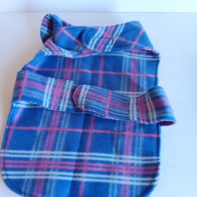 Felt dog coat with several bandanas for a small dog
