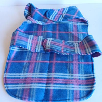 Felt dog coat with several bandanas for a small dog