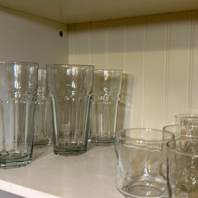 Shelf of Drinking glasses mixed sizes