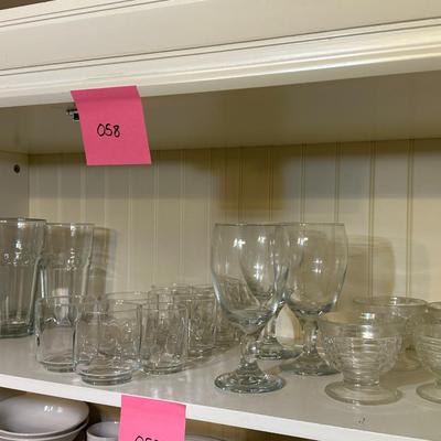 Shelf of Drinking glasses mixed sizes