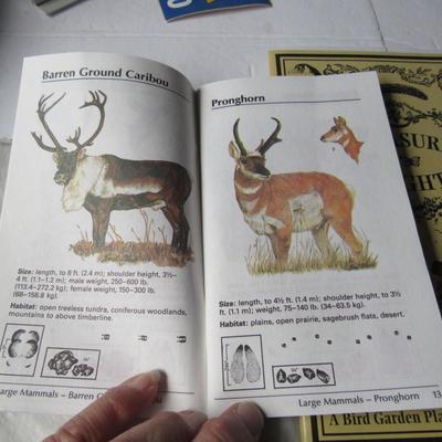 Lot 525:  Wildlife ID Pocket Guide (neat book!) and Treasured Flights Journal