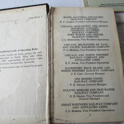 Lot 527:  Vintage Consolidated Code of Operating Rules Railroad Info, and Metra Amtrak Bookelt
