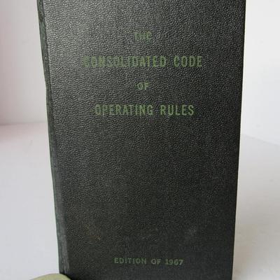 Lot 527:  Vintage Consolidated Code of Operating Rules Railroad Info, and Metra Amtrak Bookelt