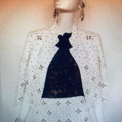 OSCAR DE LA RENTA