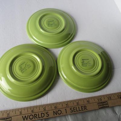 Lot 539:  Three Fiesta Saucers and Chicken Candle