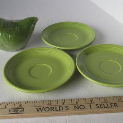 Lot 539:  Three Fiesta Saucers and Chicken Candle