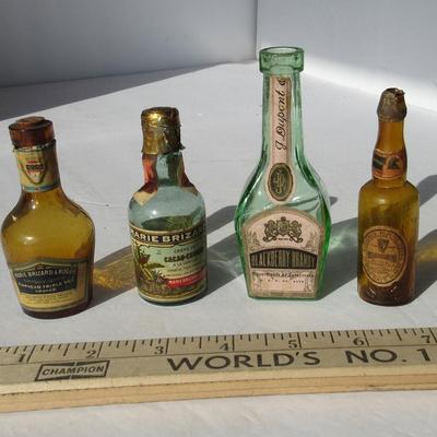 Lot 547:  4 Vintage Miniature Booze Bottles