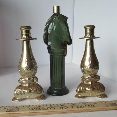 Lot 556:  3 Vintage Avon Bottles