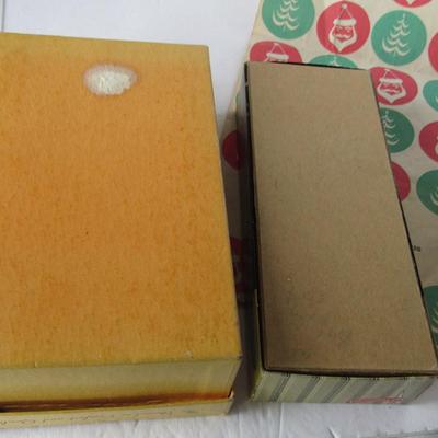 Lot 561:  2 Vintage Advertising Boxes and Christmas Bag