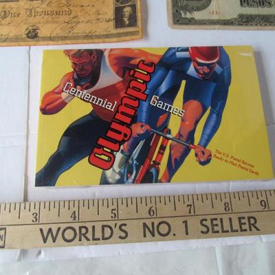 Lot 564:  Lot of Unused Postage Stamps on Images, Unopened Olympic Post Cards, Japan WWII 10 Pesos