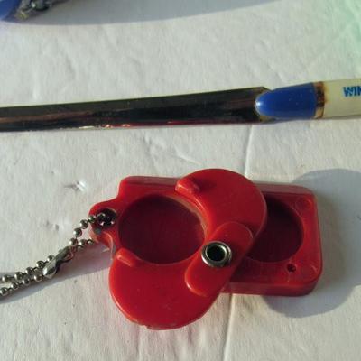 Lot 572:  Neat Junk Drawer Lot, Coin Key Ring, Hershey's Fondu Forks, Compas Key Ring, More