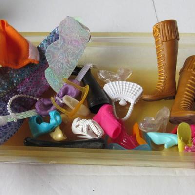Lot 591:  Vintage and New Barbie Doll Size Toys