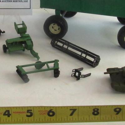 Lot 596:  Lot of Vintage Farm Toy Accessories and a Tank