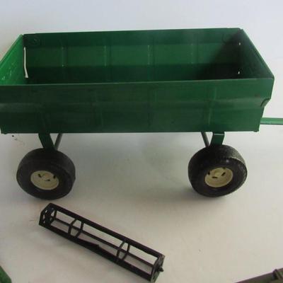 Lot 596:  Lot of Vintage Farm Toy Accessories and a Tank