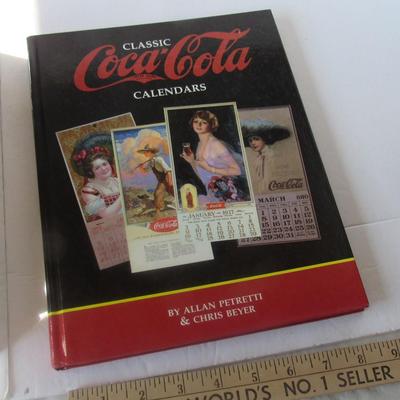 Lot 604: Classic Coca Cola Calendars Book