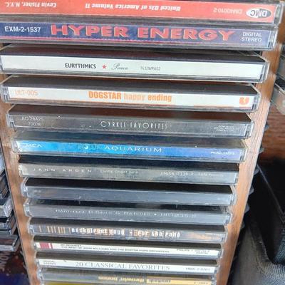 Variety of music on CD with wooden CD organizer and two travel multi - cd case organizers ONE SIGNED!