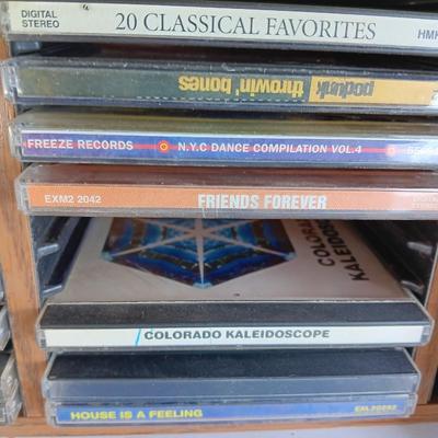 Variety of music on CD with wooden CD organizer and two travel multi - cd case organizers ONE SIGNED!