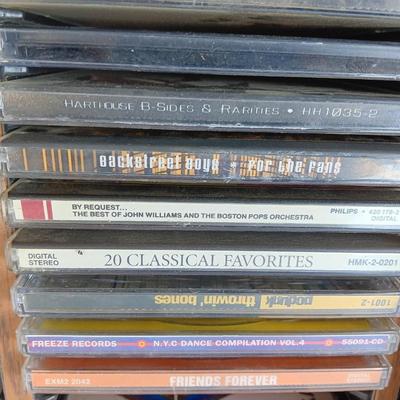 Variety of music on CD with wooden CD organizer and two travel multi - cd case organizers ONE SIGNED!