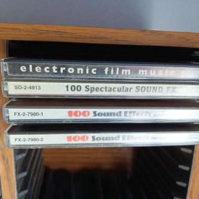 Variety of music on CD with wooden CD organizer and two travel multi - cd case organizers ONE SIGNED!