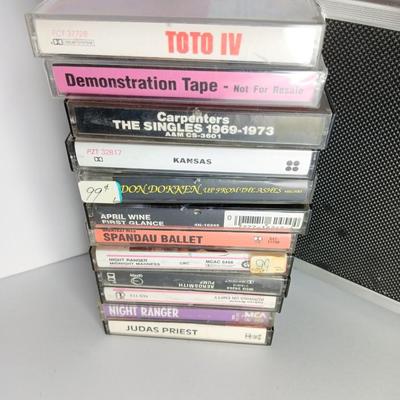 Great music on cassette tape - some classics!  with sturdy black handled case