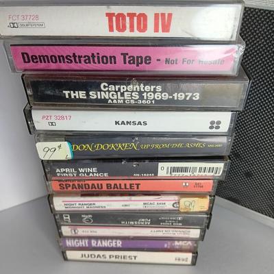 Great music on cassette tape - some classics!  with sturdy black handled case