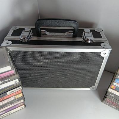 Great music on cassette tape - some classics!  with sturdy black handled case