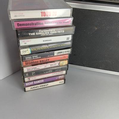 Great music on cassette tape - some classics!  with sturdy black handled case