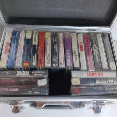 Great music on cassette tape - some classics!  with sturdy black handled case