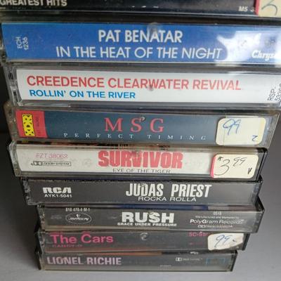 Great music on cassette tape - some classics!  with sturdy black handled case