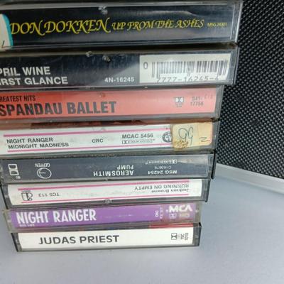Great music on cassette tape - some classics!  with sturdy black handled case