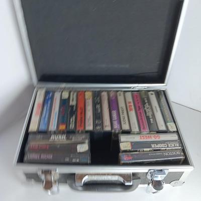 Great music on cassette tape - some classics!  with sturdy black handled case