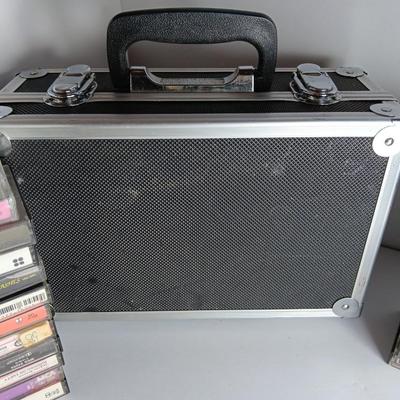 Great music on cassette tape - some classics!  with sturdy black handled case