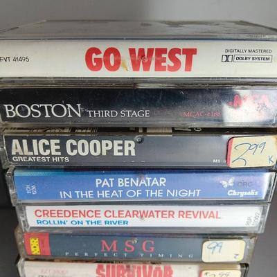 Great music on cassette tape - some classics!  with sturdy black handled case