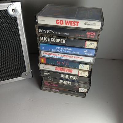 Great music on cassette tape - some classics!  with sturdy black handled case