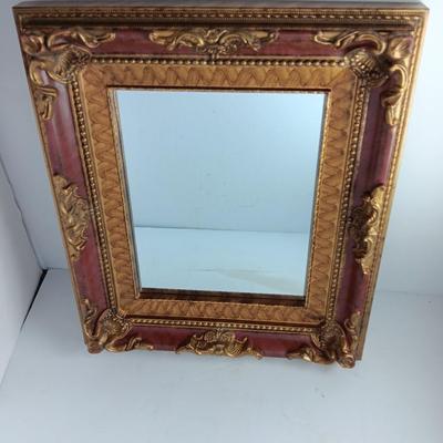 Decorative framed wall mirror with small Shelf