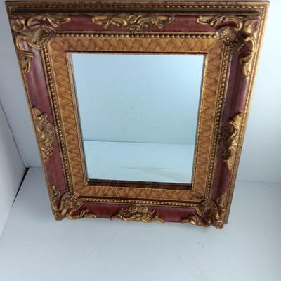 Decorative framed wall mirror with small Shelf