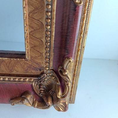 Decorative framed wall mirror with small Shelf