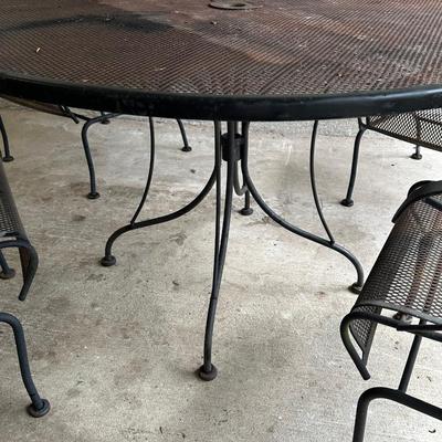 Iron Table & Four (4) Rocker Chairs