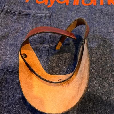 Vintage Apron, Leather Visor, Boots
