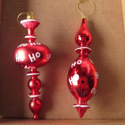 Lot 627:  Two Long Red HoHoHo Christmas Ornaments