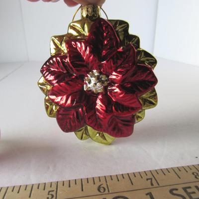 Lot 629:  Three Figural Glass Christmas Ornaments
