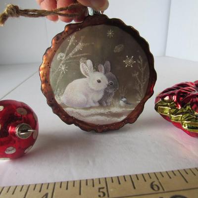 Lot 629:  Three Figural Glass Christmas Ornaments